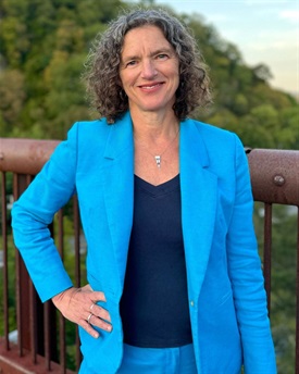 Photo of County Executive Jen Metzger standing on the Rosendale Trestle