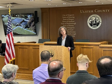 Photo of County Executive Jen Metzger delivering her 2026 Budget Address in the chambers of the County Legislature.